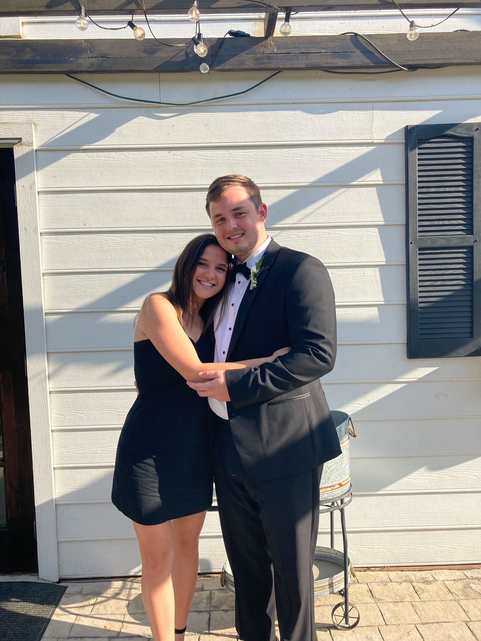 Coach Bryan and his wife, Alexandra.